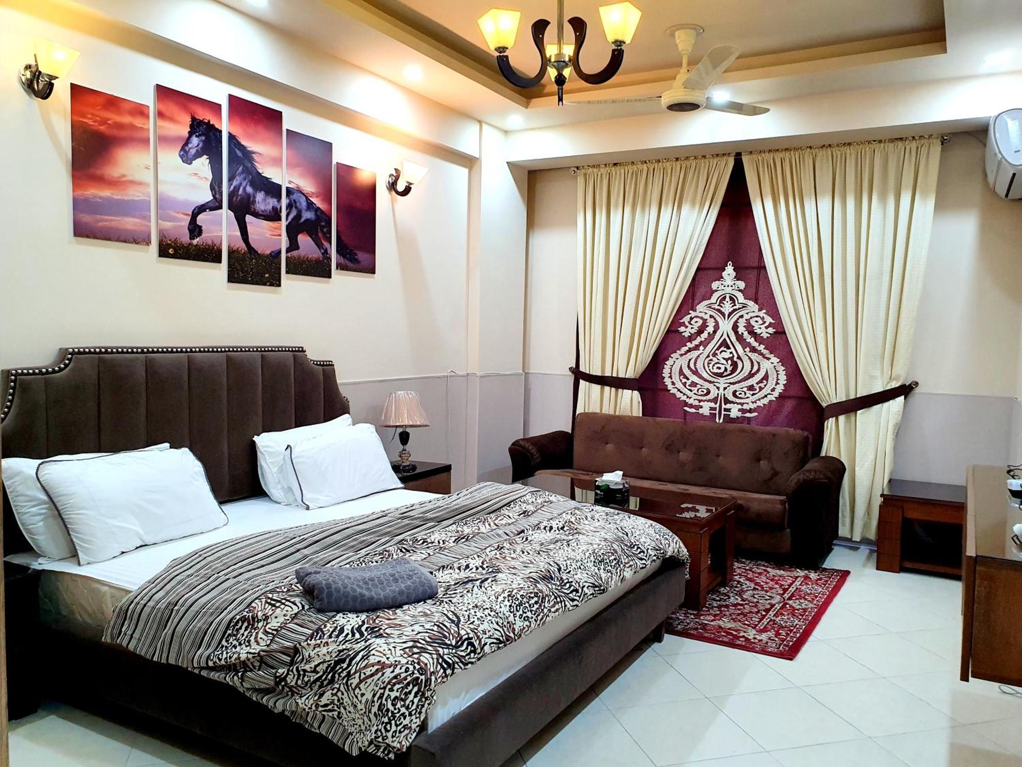 Luxurious Landing Apartments & Suites Bahria Town Rawalpindi Room photo